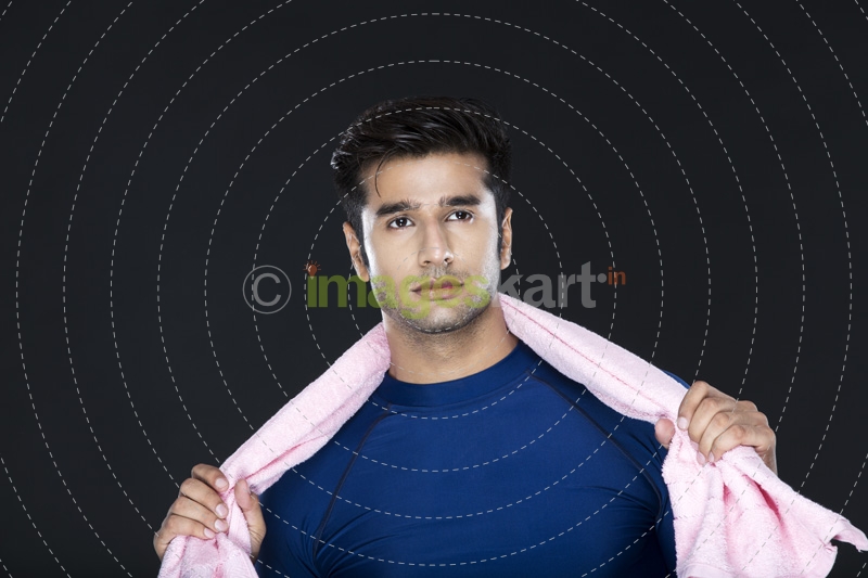 man posing with towel 