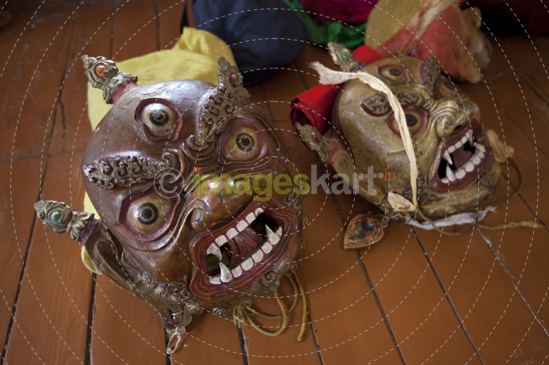 traditional ladakhi masks on floor