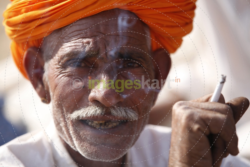 village man smoking cigarette 
