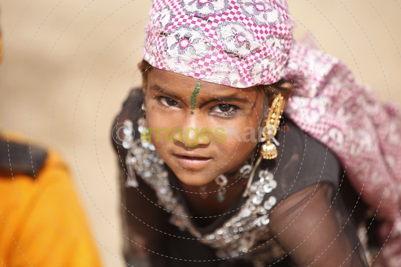 child performing at the village fair 