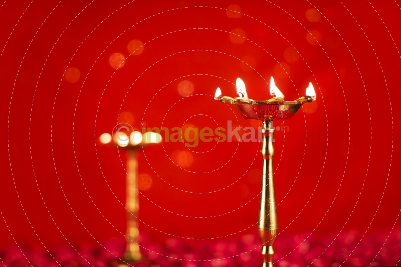 diya stand and rose petals 