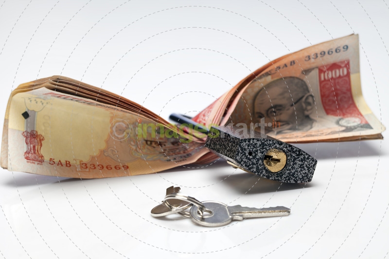 cash with lock and keys 