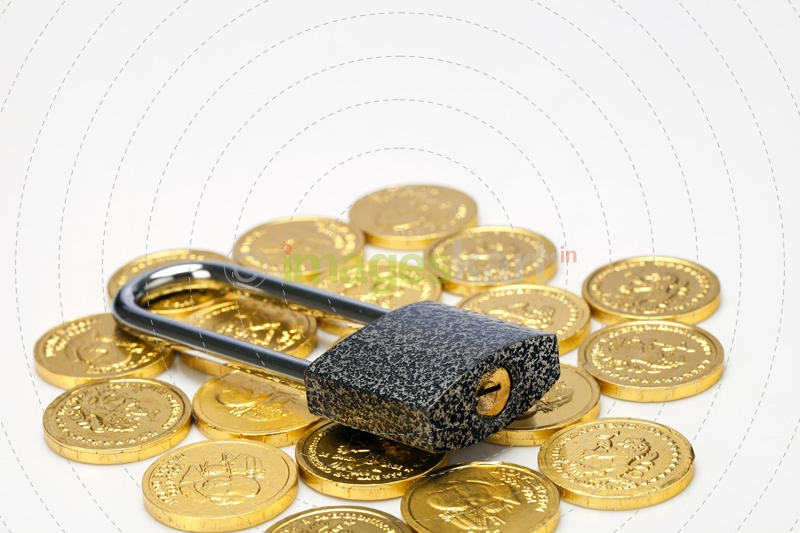 gold coin and lock