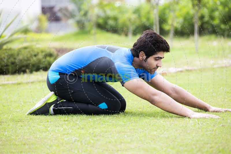 man exercising in park