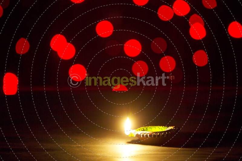 red coloured lights and diya 