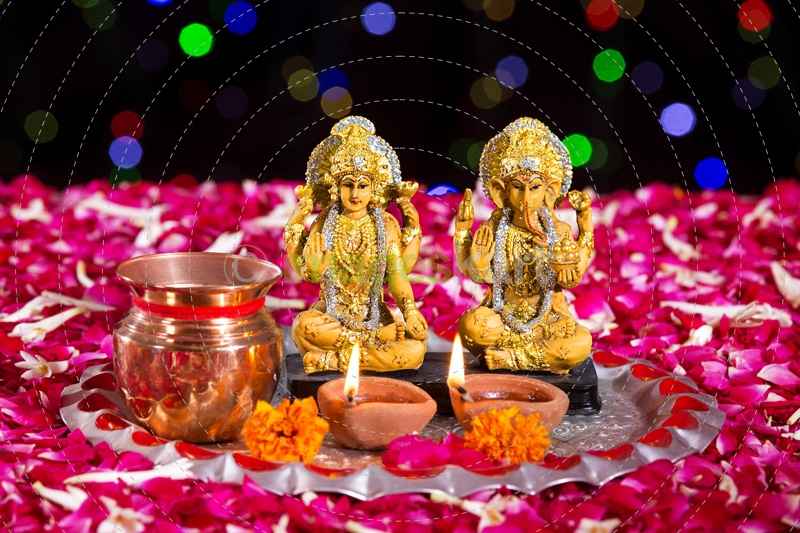 lord ganesha and luxmi in pooja thaali