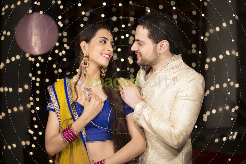 husband gifting necklace to his wife on diwali 