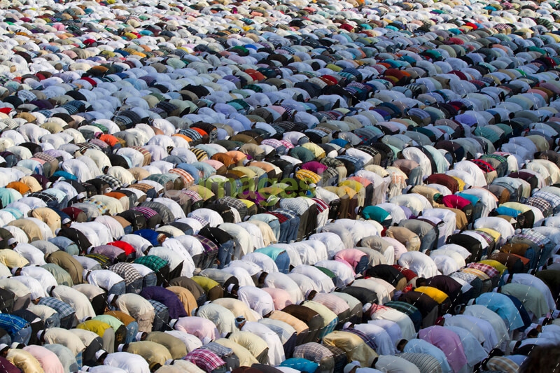 people bow down for prayer 
