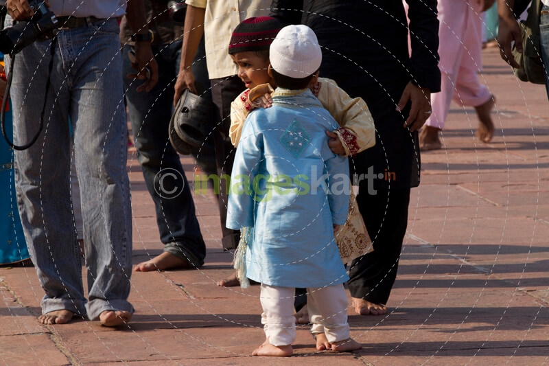 children embracing each other during eid festival 