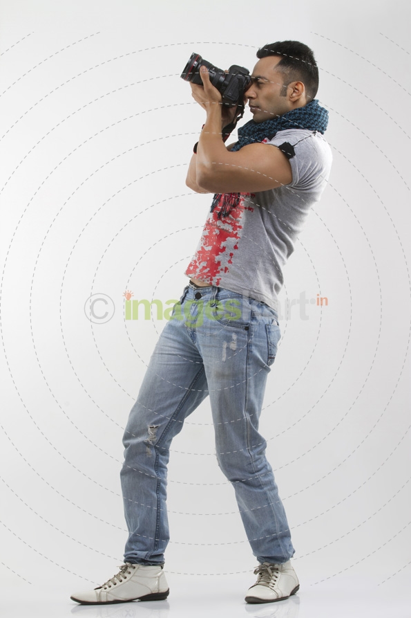 portrait of a well-built man taking pictures