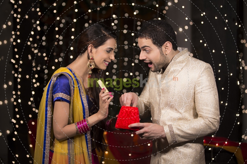 woman giving surprise to her husband 