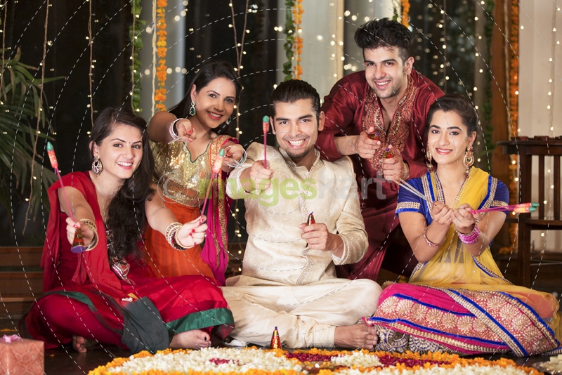 couples with crackers on diwali 
