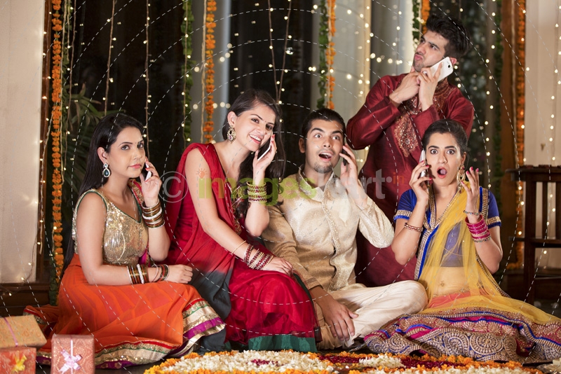 friends on diwali busy talking on the phone