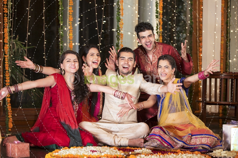 friends cheering together on diwali