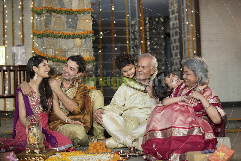  family celebrating diwali together 