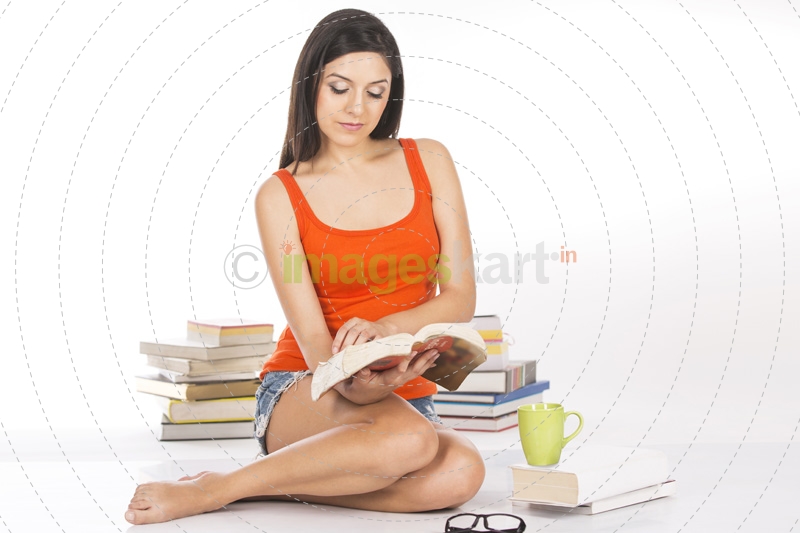 attractive girl reading a book