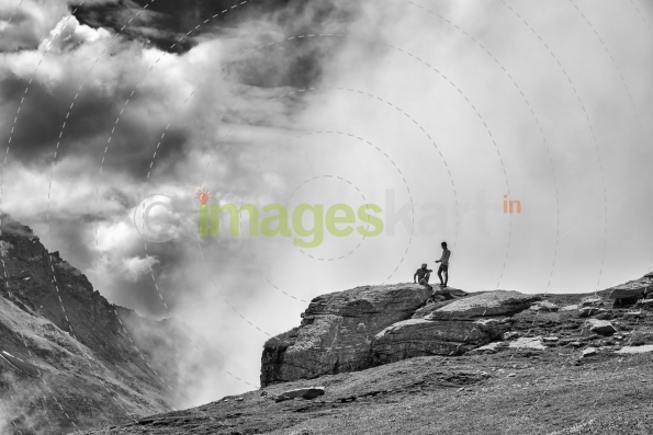 Trekkers by the cliff