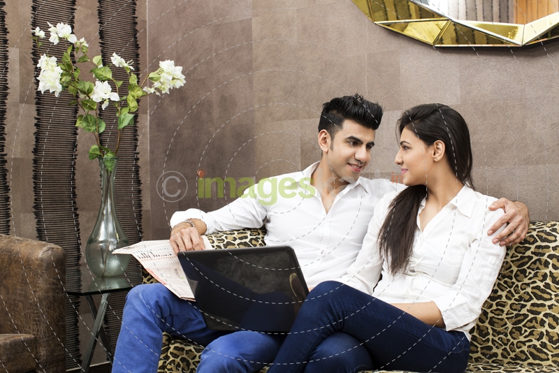 couple at home looking at each other