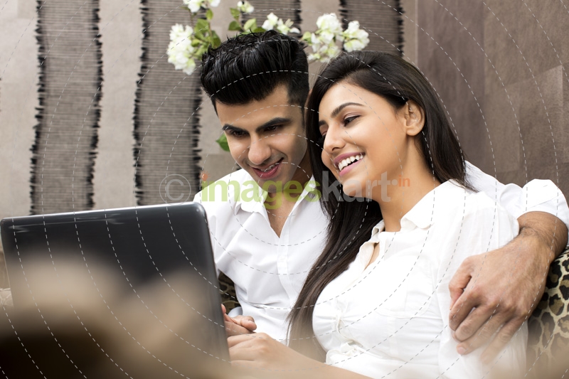 couple with laptop