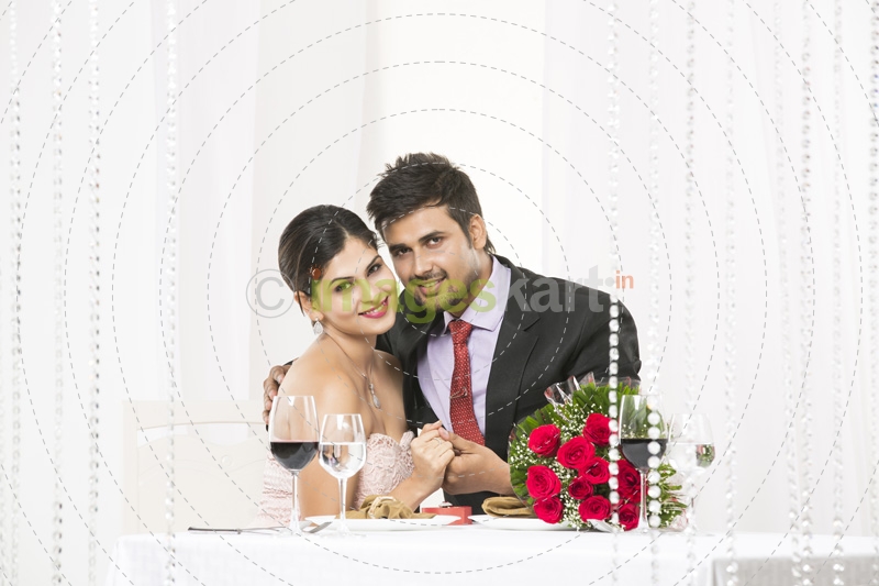 young couple on dinner at the restaurant