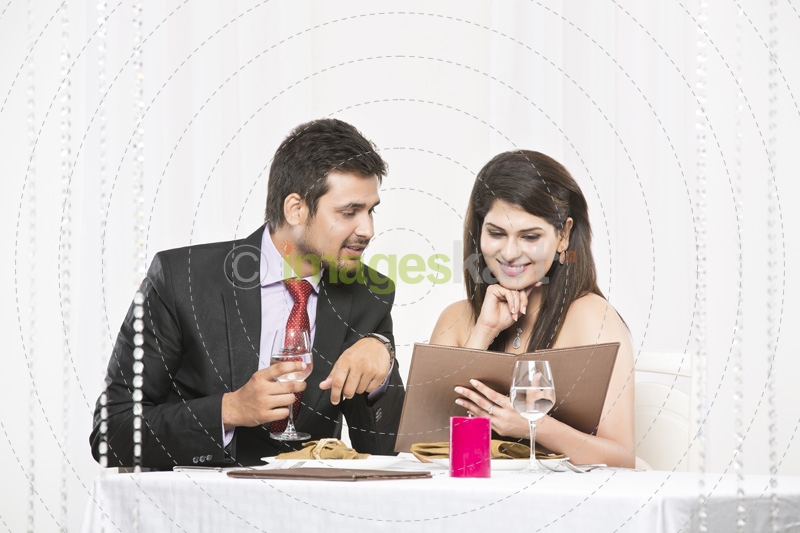 couple deciding the menu for dinner
