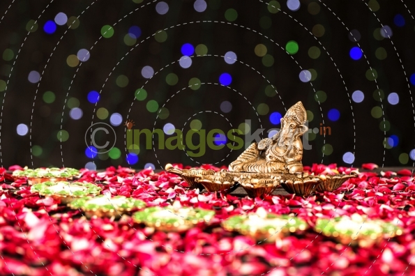 lord ganesha idol and diya stand 