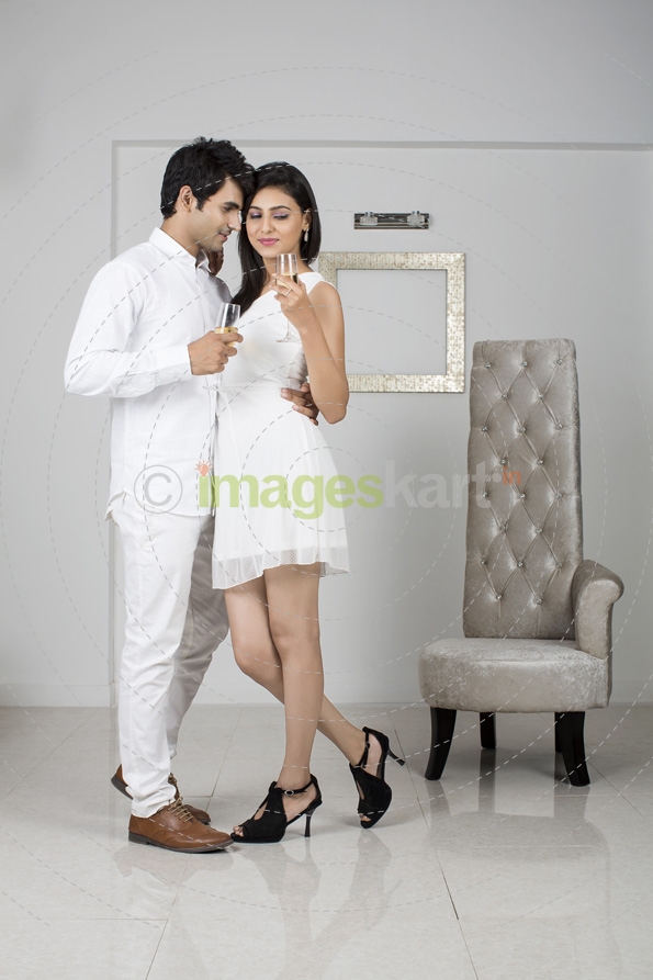 couple in white dress dancing and romancing 