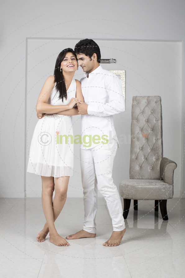 couple in white dress dancing and romancing 