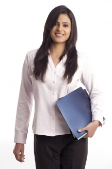 female executive carrying a file of documents