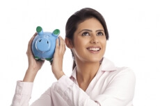 woman with piggy bank isolated on white