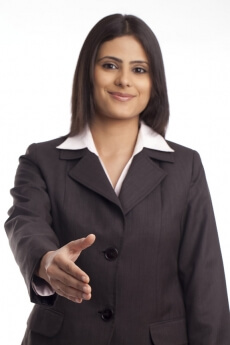 corporate young lady giving a handshake gesture