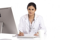 female doctor giving prescription 