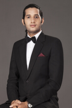 Man posing in a suit