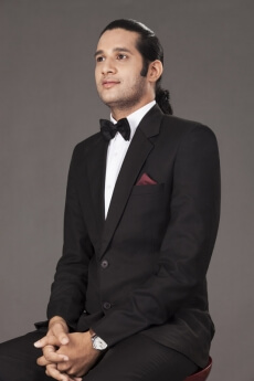 man siting in a suit