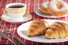 fresh sweet snack with tea and donuts