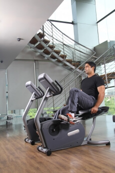 man doing cycling at the gym