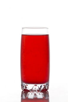 red coloured soda drink