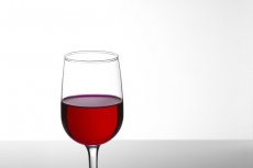 glass of red wine with white background 