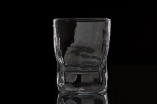 an empty glass of scotch