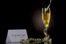 champagne glass with frills and note