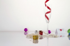 gifts and champagne glass with a love note