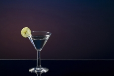 slice of a lemon mint on a martini