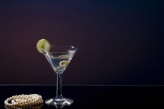 drink with olive garnish