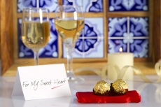 love message with chocolates and drinks