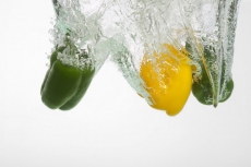 fresh capsicums dropped in water