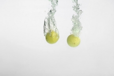 lemon in water forming an abstract art 