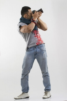 man with good physique taking pictures
