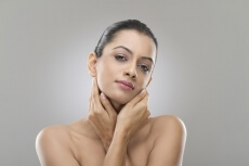 beautiful woman with hands on her face