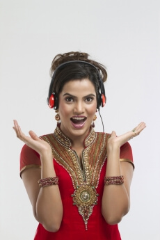 girl in ethnic wear with headphones