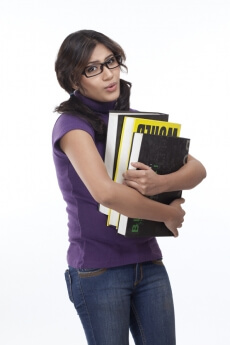 girl carrying heavy books